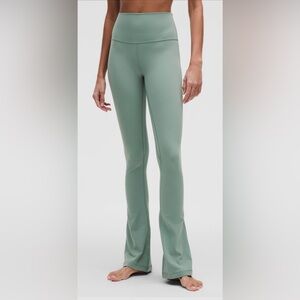 lululemon athletica mint green high-waisted, mini-flare leggings. 31” inseam.